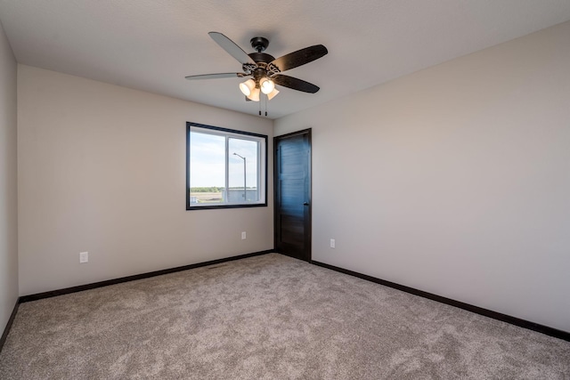 3108 Scotch Ln, Mankato, MN 56001 - spare room featuring carpet flooring, baseboards, and ceiling fan