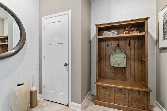 mudroom featuring baseboards