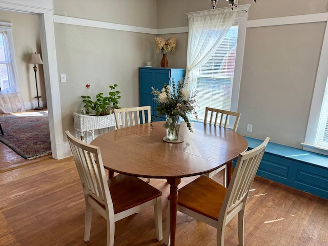 dining room with light wood-style floors