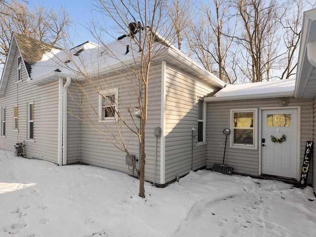 view of snow covered property