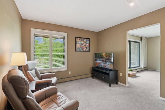 7520 Cahill Rd Unit 121A, Edina, MN 55439 - living area featuring baseboard heating, light colored carpet, and baseboards