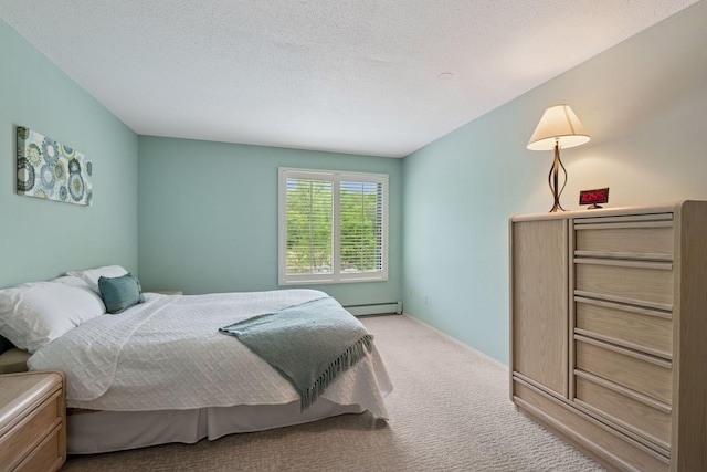 7520 Cahill Rd Unit 121A, Edina, MN 55439 - bedroom featuring carpet floors, baseboard heating, and a textured ceiling
