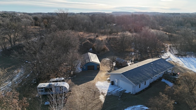 aerial view with a wooded view