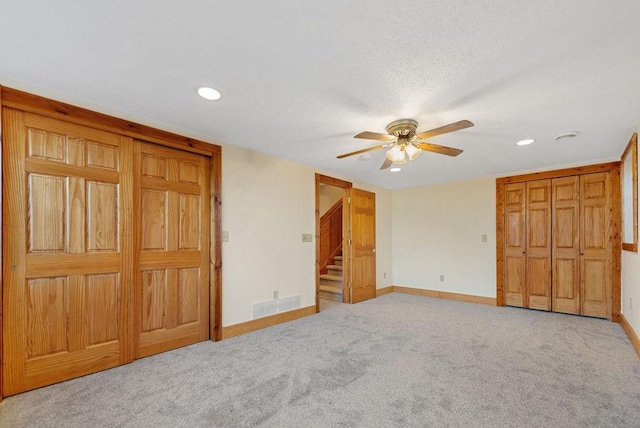 unfurnished bedroom featuring visible vents, ceiling fan, baseboards, carpet floors, and recessed lighting