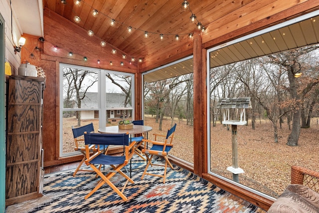 sunroom / solarium with wood ceiling