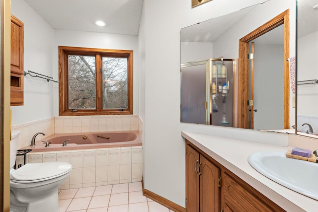 full bathroom with toilet, a shower with door, tile patterned floors, a garden tub, and vanity