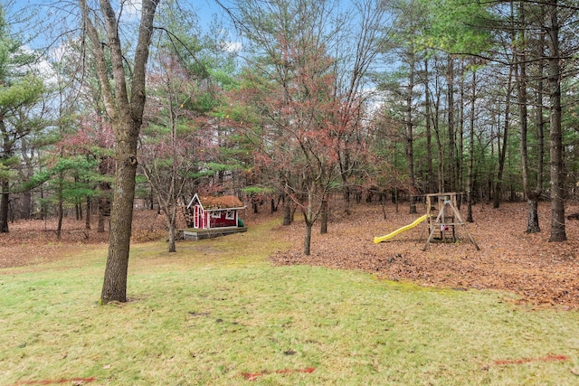 view of yard with a playground