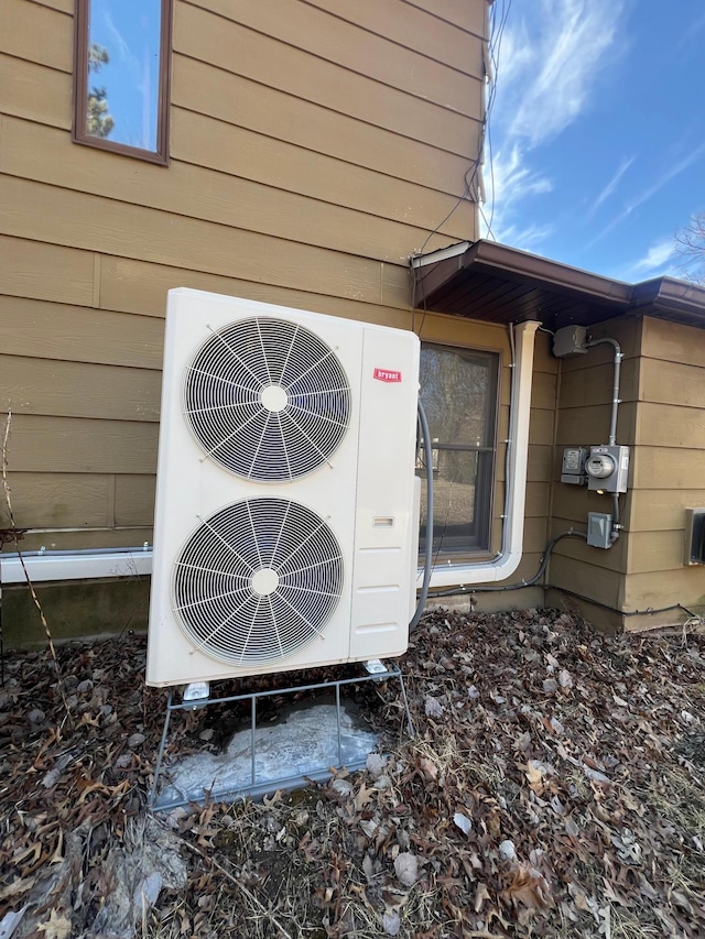21888 650th Ave, Dexter, MN 55926 - exterior view of an ac unit and electric meter