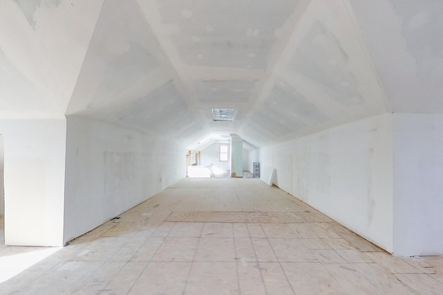 bonus room featuring lofted ceiling