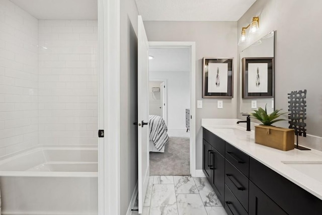 bathroom featuring a sink, baseboards, marble finish floor, shower / washtub combination, and double vanity