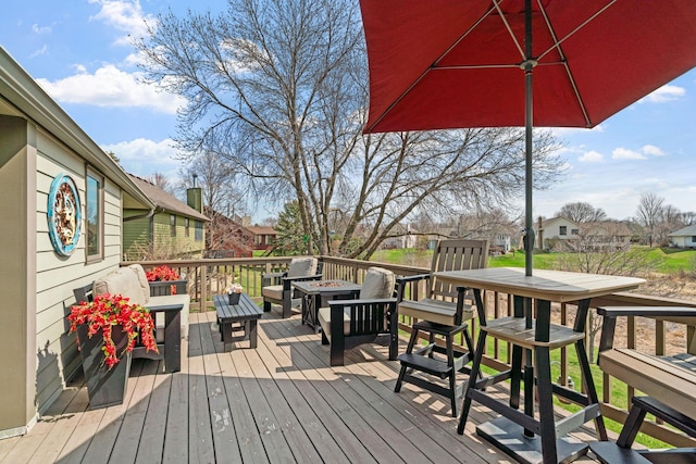 wooden deck with a residential view