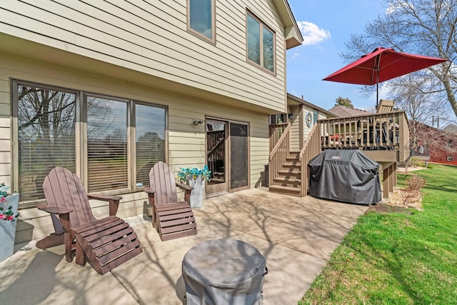 view of patio / terrace with stairway and a deck