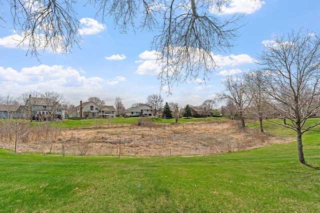 view of yard featuring a residential view