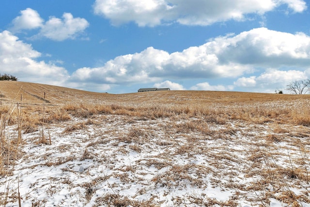 snowy view with a rural view