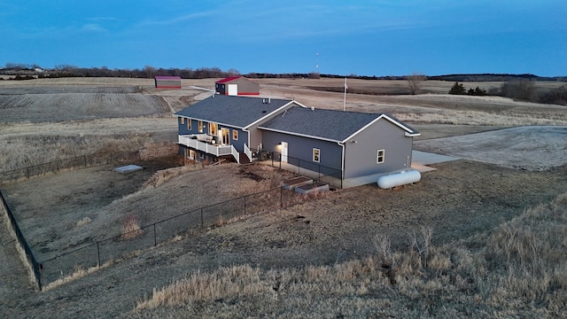 birds eye view of property featuring a rural view