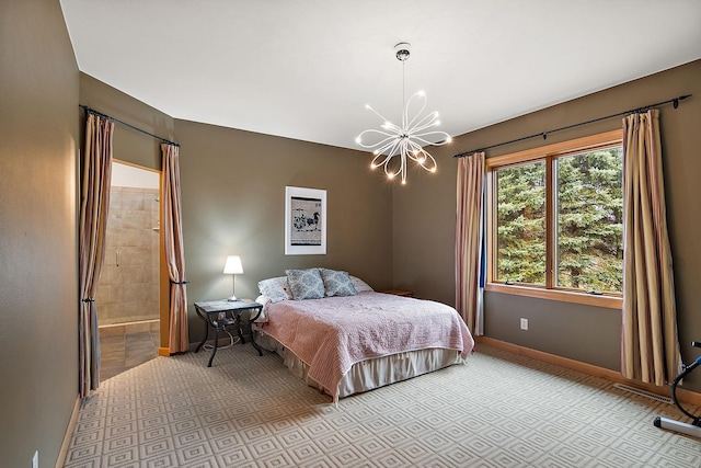 carpeted bedroom with a notable chandelier and baseboards