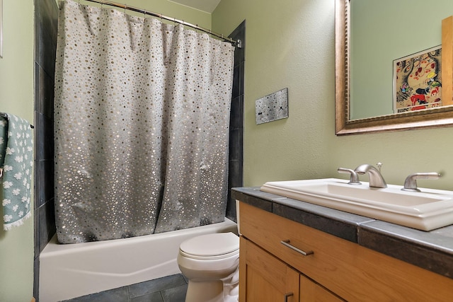 full bath with tile patterned floors, vanity, toilet, and shower / tub combo with curtain