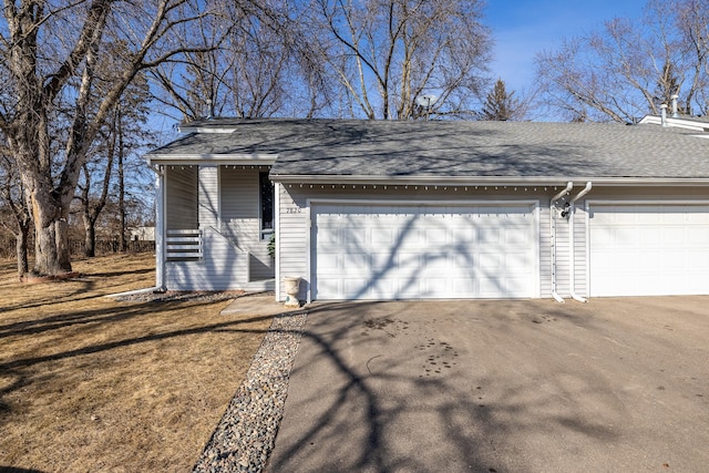 garage with driveway