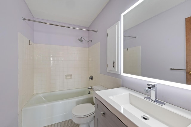 bathroom featuring vanity, toilet, and shower / bath combination