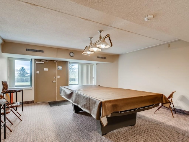 playroom featuring visible vents, carpet floors, a textured ceiling, and billiards