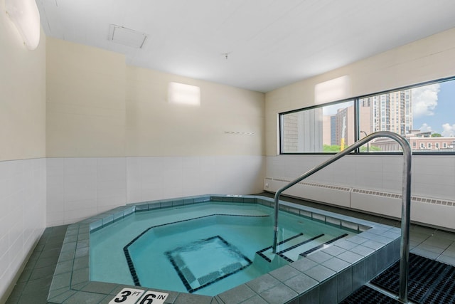 view of pool featuring an indoor in ground hot tub