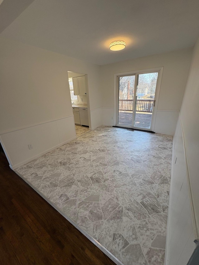 spare room with light wood finished floors