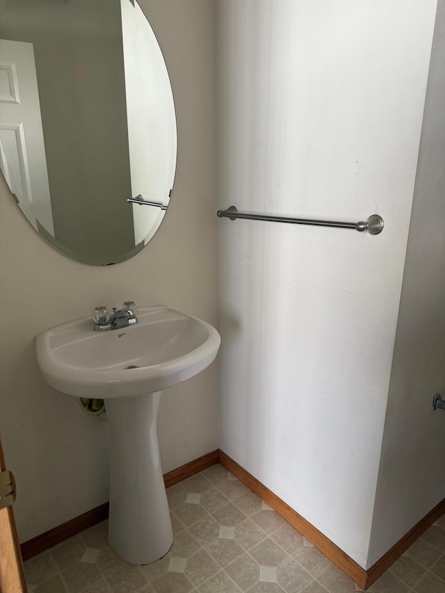 bathroom featuring baseboards