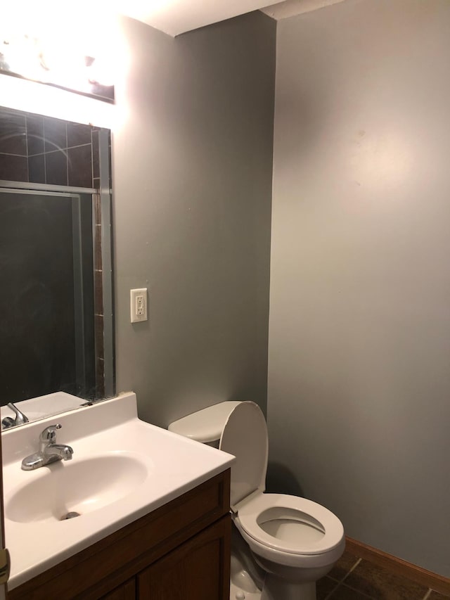 full bath with tile patterned floors, a shower, toilet, and vanity