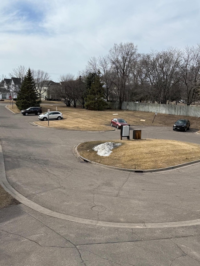 view of street featuring curbs