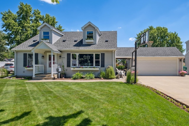 cape cod house featuring driveway, a front yard, roof with shingles, and an attached garage