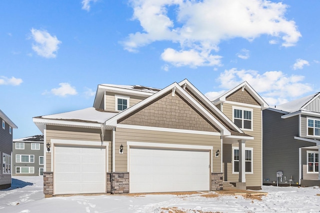 craftsman-style house featuring a garage