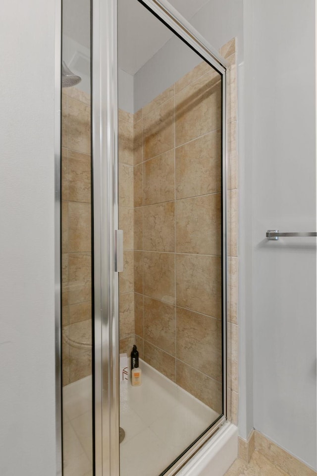 full bathroom with a stall shower