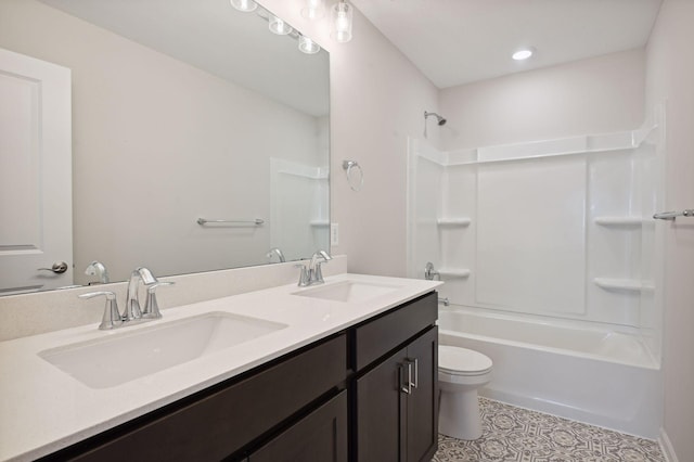 bathroom featuring shower / tub combination, a sink, toilet, and double vanity