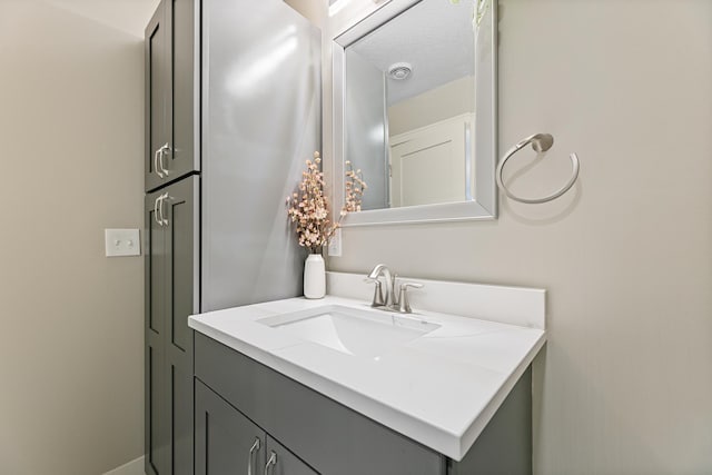 bathroom featuring visible vents and vanity