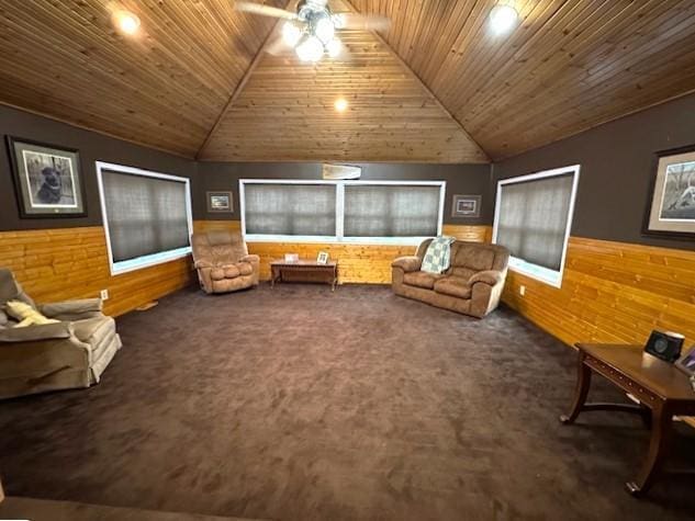 1344 385th Ave, Ten Mile Lake Twp, MN 56218 - living area with wood ceiling, lofted ceiling, a ceiling fan, wainscoting, and wood walls