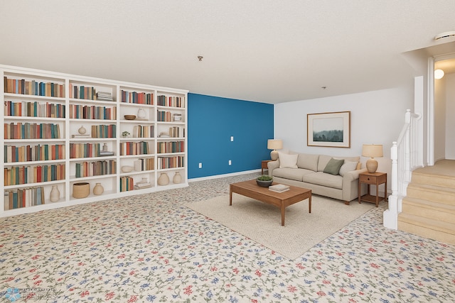 2501 30th Ave S Unit 102, Fargo, ND 58103 - living area featuring carpet floors, stairs, and baseboards