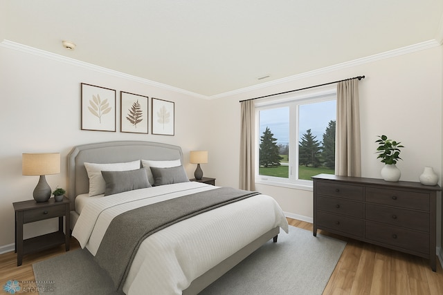 2501 30th Ave S Unit 102, Fargo, ND 58103 - bedroom with crown molding, light wood finished floors, and baseboards