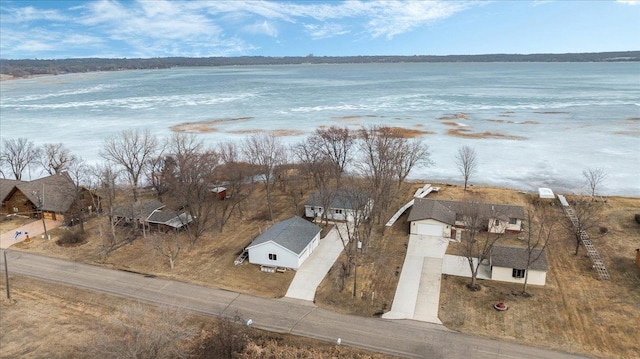 drone / aerial view with a water view