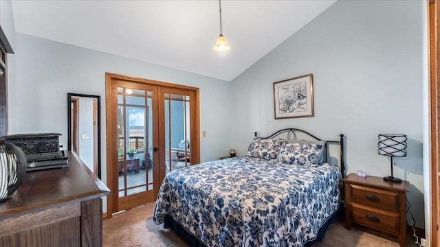 bedroom with french doors, carpet floors, vaulted ceiling, and access to outside