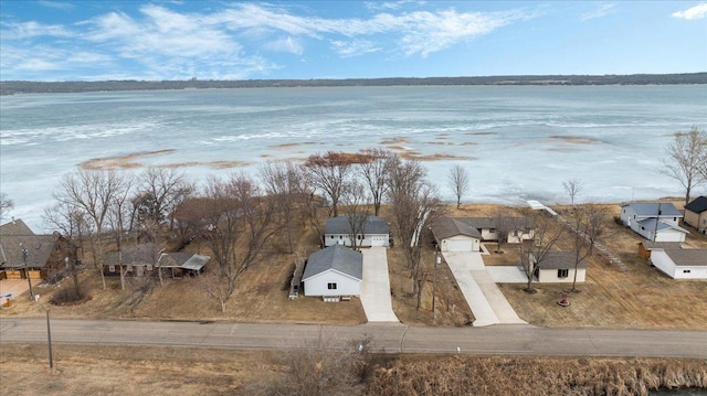 birds eye view of property featuring a water view