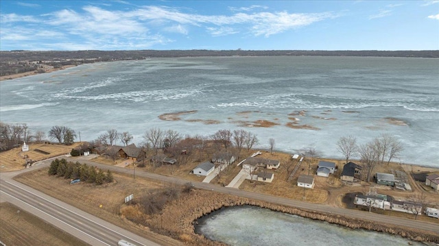 drone / aerial view with a water view