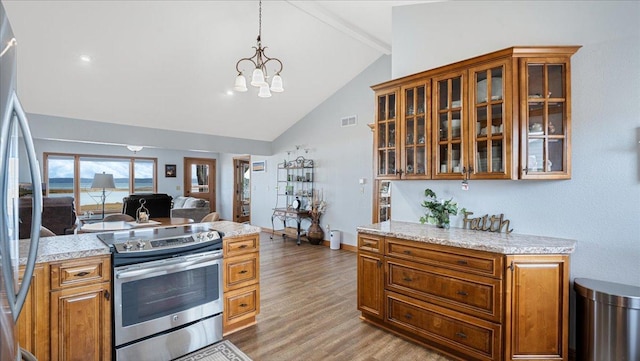kitchen with visible vents, vaulted ceiling with beams, appliances with stainless steel finishes, light wood-type flooring, and a chandelier