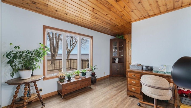 office area featuring wooden ceiling, baseboards, and light wood-style floors