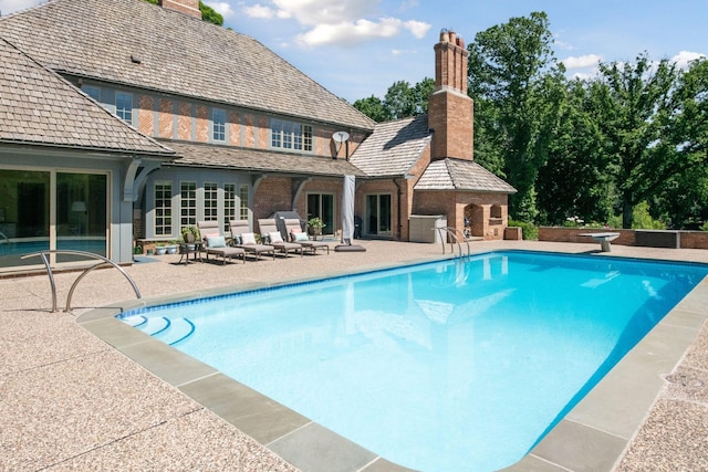 pool with a patio