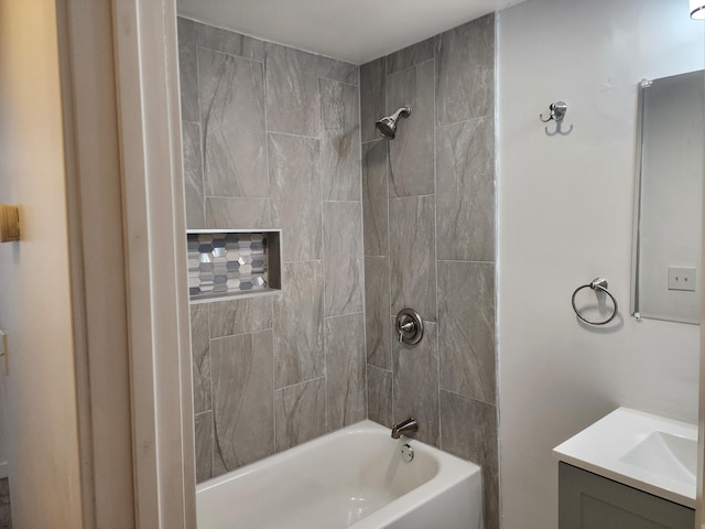 bathroom with washtub / shower combination and vanity