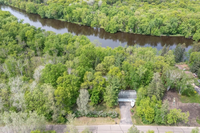 bird's eye view featuring a water view and a wooded view