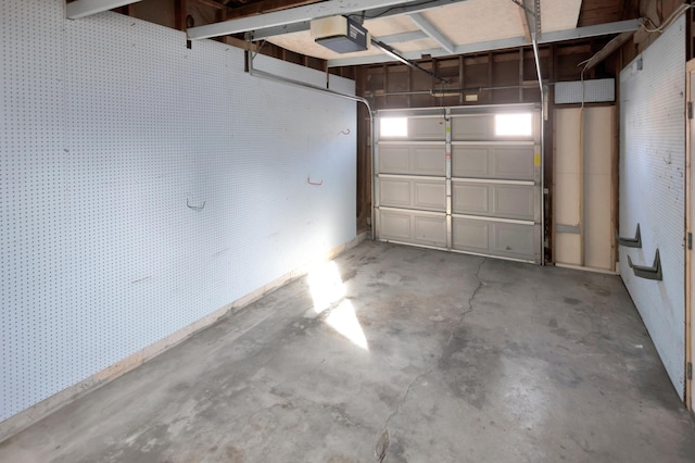 garage featuring a garage door opener