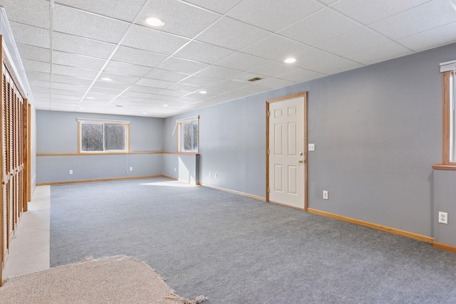 carpeted empty room with recessed lighting, a paneled ceiling, and baseboards