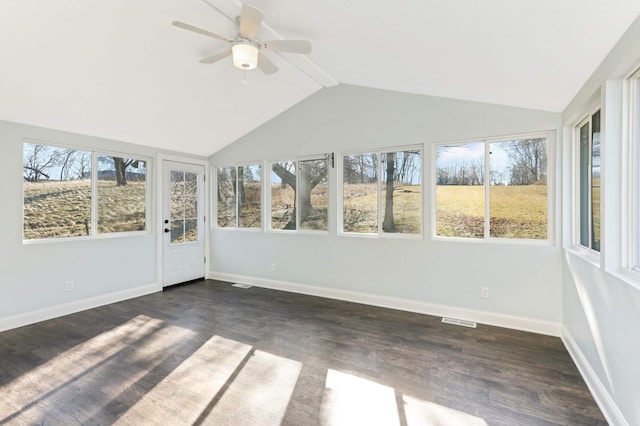 unfurnished sunroom with visible vents, lofted ceiling with beams, baseboards, and wood finished floors