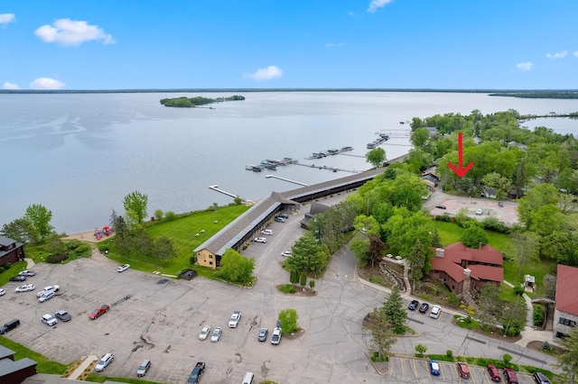 birds eye view of property featuring a water view